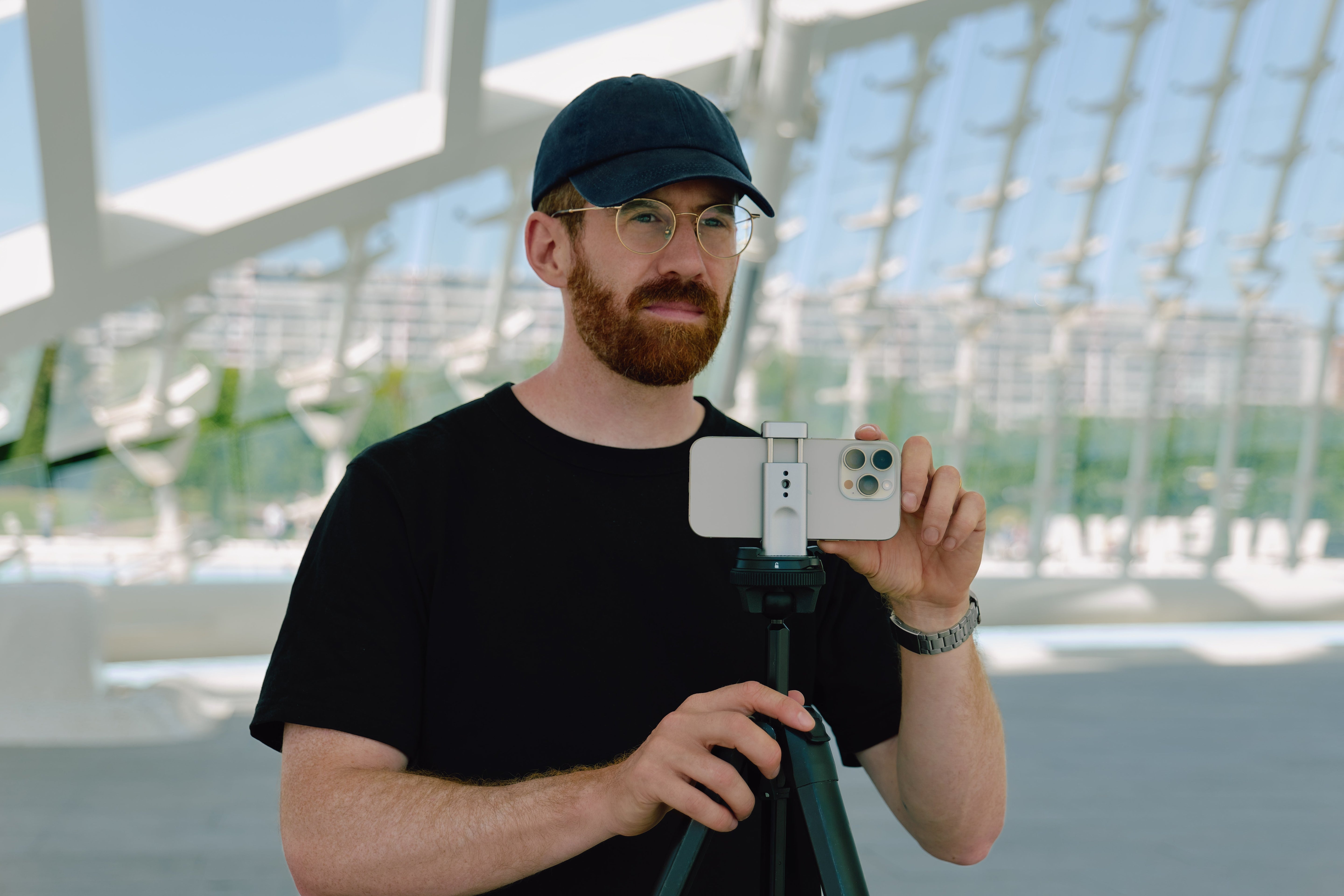 Tyler Stalman mobile phone clamp securely mounted for professional video filming with KONDOR BLUE rig.